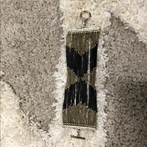 Gold and black bracelet